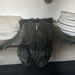 Olive green Ivy park rain jacket